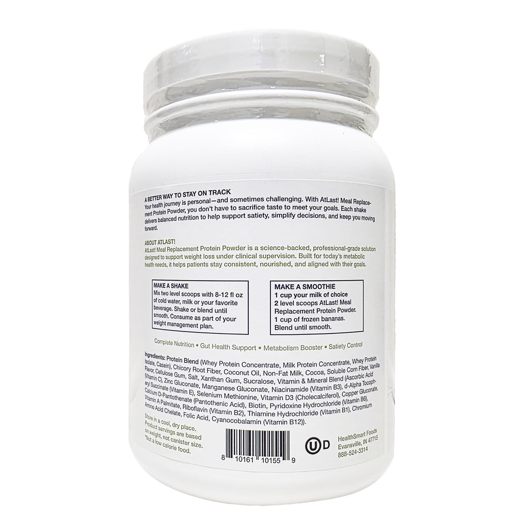 Rich chocolate meal replacement shake poured in glass made with AtLast! protein powder